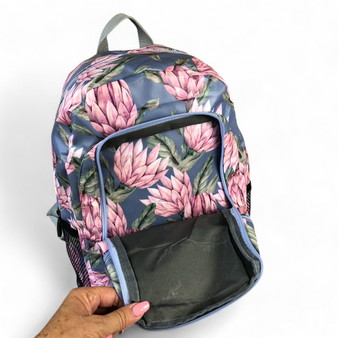 Cotton Road Backpack: BLUE PVC Backpack with PROTEAS