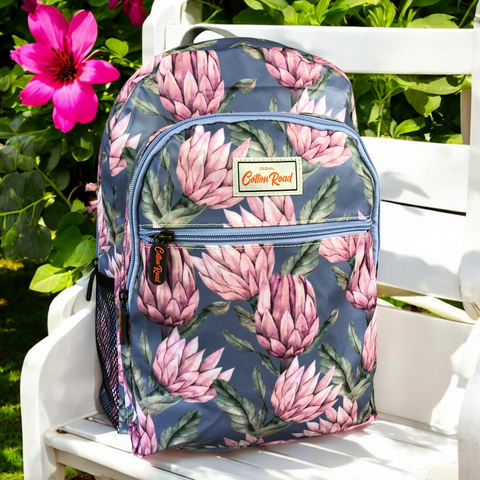 Cotton Road Backpack: BLUE PVC Backpack with PROTEAS