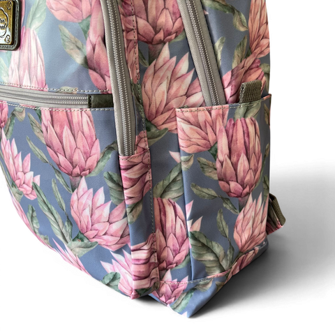Cotton Road Backpack: Stylish Blue PVC 15.6" Laptop Bag with Proteas