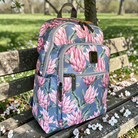 Cotton Road Backpack: Stylish Blue PVC 15.6" Laptop Bag with Proteas