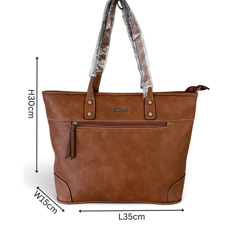 Cotton Road Handbag in brown PU leather with twin handles, contrast stitching and front zip pocket