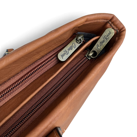 Cotton Road Handbag in warm brown PU leather, featuring twin zip compartments and branded antique-look zip pulls
