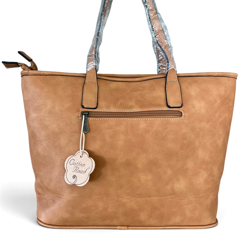 Cotton Road Handbag in tan PU leather with twin handles, front zip pocket, contrast stitching and logo charm