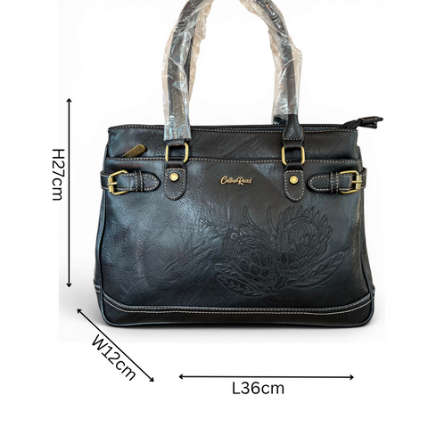 Cotton Road black PU leather handbag and matching wallet with embroidered Protea design and antique brass hardware