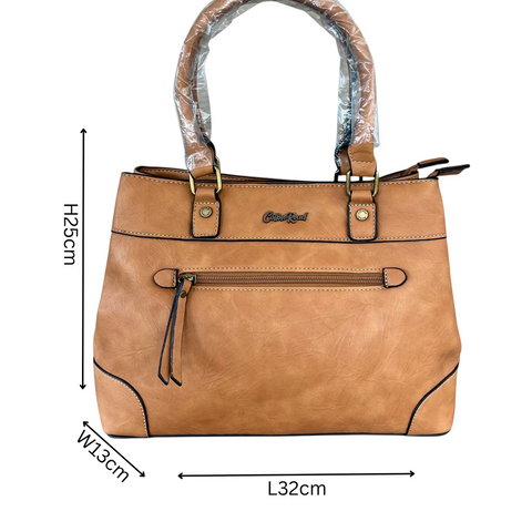 Cotton Road Handbag in tan PU leather with twin handles, contrast stitching and front zip pocket
