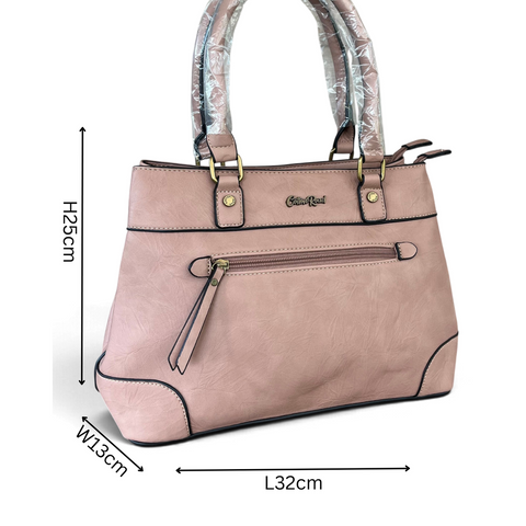 Cotton Road Handbag in dusty pink PU leather with black trim, twin handles and front zip pocket
