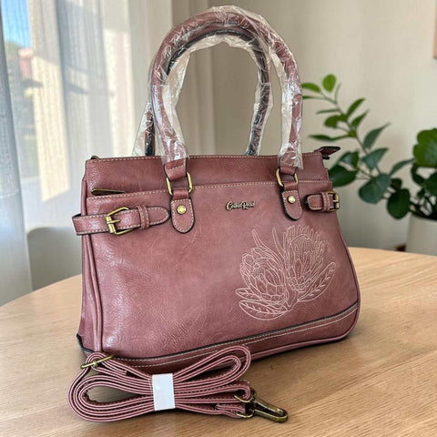 Cotton Road Handbag: Stylish PINK PU Leather Bag with EMBROIDERED PROTEA Design