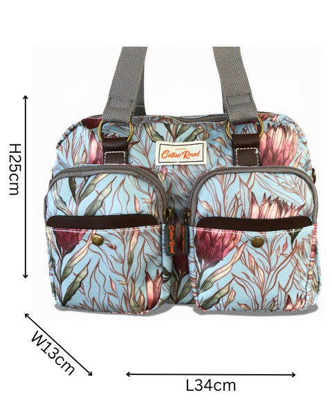 Cotton Road Handbag: TURQUOISE PVC Handbag with PROTEAS