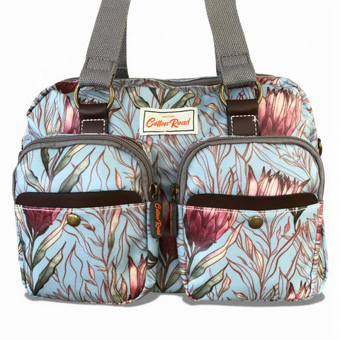 Cotton Road Handbag: TURQUOISE PVC Handbag with PROTEAS