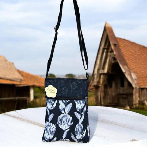 Cotton Road Sling Bag: BLACK FLORAL Canvas Mini Sling Bag with PROTEAS