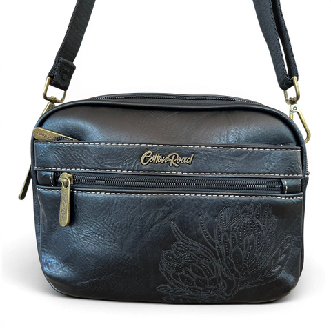 Cotton Road Sling Bag black PU leather crossbody with embroidered Protea and branded strap