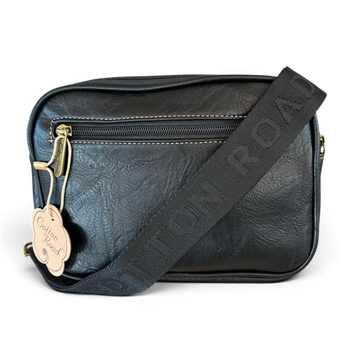Cotton Road Sling Bag black PU leather crossbody with embroidered Protea and branded strap
