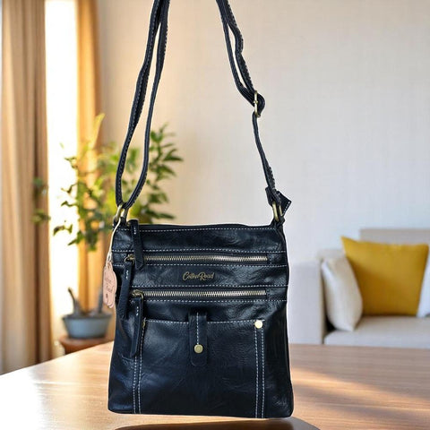 Cotton Road Sling Bag: BLACK PU Leather Sling Bag with Metal Zips