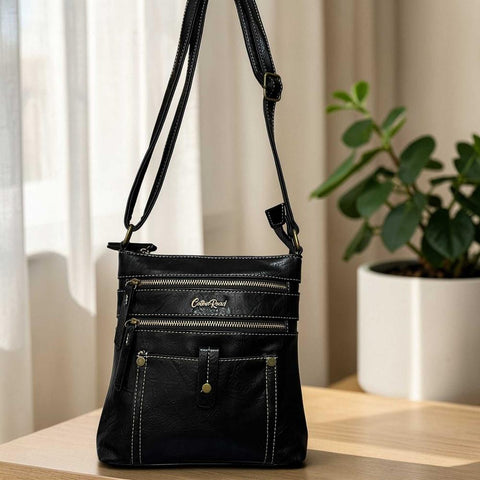 Cotton Road Sling Bag: BLACK PU Leather with Metal Zips