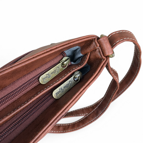 Cotton Road Sling Bag: BROWN PU Leather Sling Bag with STRAP detailing