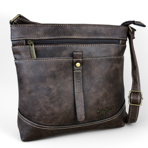 Cotton Road Sling Bag: BROWN PU Leather Sling Bag with STRAP detailing