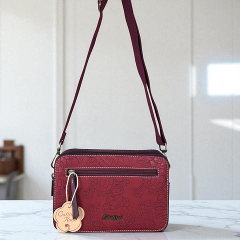 Cotton Road Sling Bag: MAROON RED PU Leather Sling Bag with EMBOSSED FLOWERS