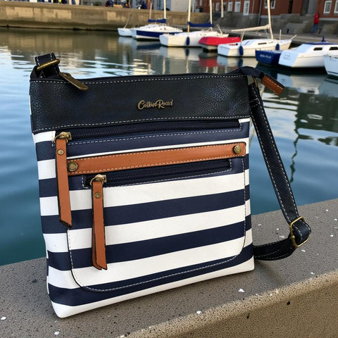 Cotton Road Sling Bag: NAVY BLUE and WHITE PVC Sling Bag with STRIPES and TAN Trim detailing