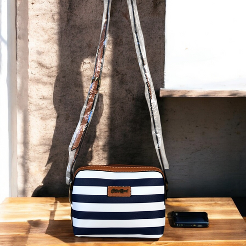 Cotton Road Sling Bag: NAVY and WHITE Striped PVC Sling Bag with TAN Trim