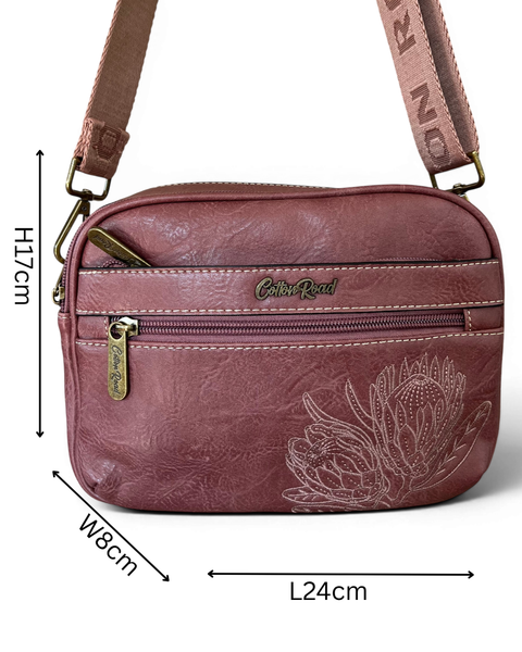 Cotton Road Sling Bag: PINK PROTEA Design PU Leather Sling Bag with BRANDED STRAP