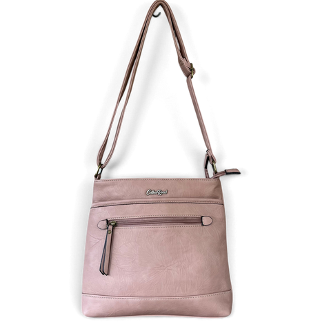 Cotton Road Sling Bag in dusty pink PU leather with embossed floral texture, stitched panels and zip pockets.