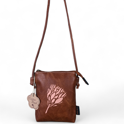 Cotton Road Sling Bag: TAN BROWN PU LEATHER Mini Sling Bag with PROTEA