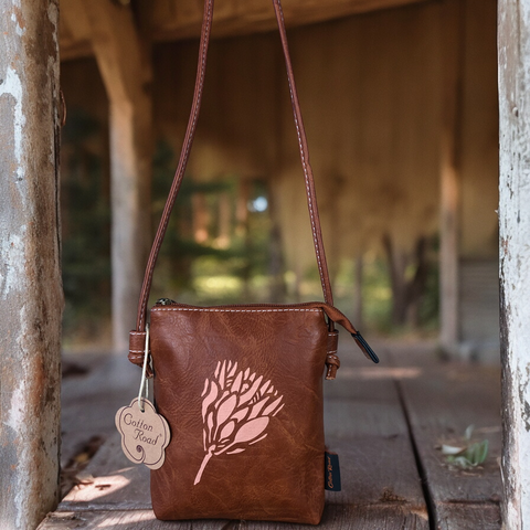 Cotton Road Sling Bag: TAN BROWN PU LEATHER Mini Sling Bag with PROTEA