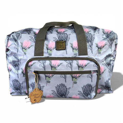 Cotton Road Travel Bag: BLUE PVC Foldaway WEEKENDER Bag with PROTEA Design