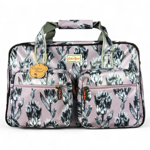 Cotton Road Travel Bag: PURPLE PVC Overnight Travel Bag with PROTEAS
