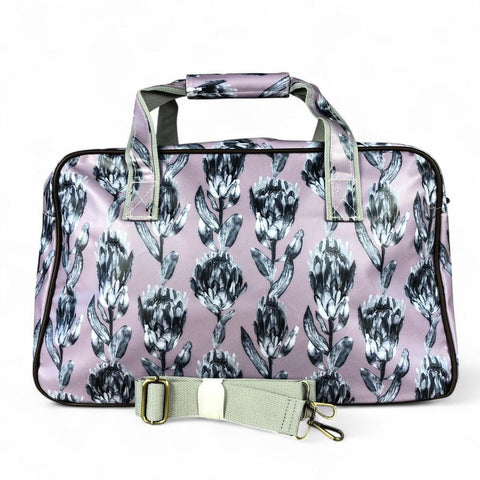 Cotton Road Travel Bag: PURPLE PVC Overnight Travel Bag with PROTEAS