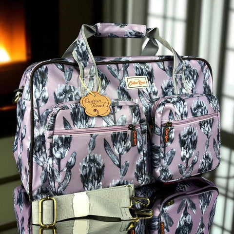 Cotton Road Travel Bag: PURPLE PVC Overnight Travel Bag with PROTEAS