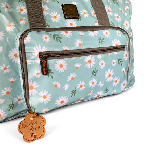 Cotton Road Travel Bag turquoise floral PVC foldaway weekender with daisy pattern and carry handles