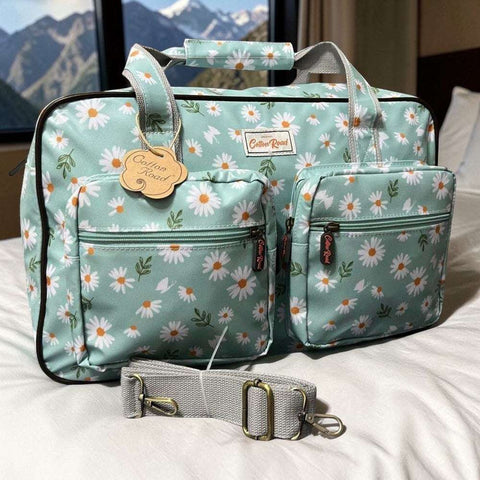 Cotton Road Travel Bag: TURQUOISE PVC Overnight Bag with DAISIES