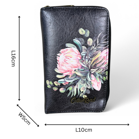Cotton Road black PU leather sling bag with adjustable strap and matching Protea floral wallet set