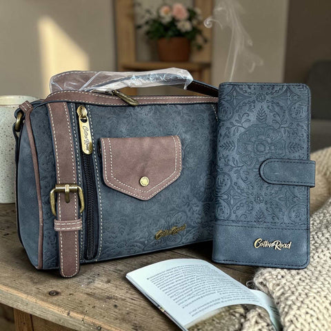 Cotton Road Sling Bag in charcoal black PU leather with matching embossed wallet and brown trim