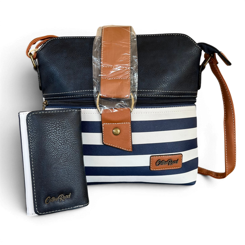 Cotton Road navy blue and white stripe crossbody sling bag with matching tri-fold wallet featuring tan trim and gold hardware.
