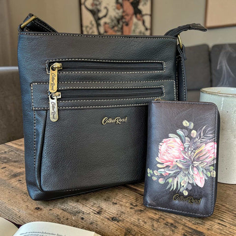 Cotton Road Sling Bag black PU leather with matching Protea design wallet set for everyday use