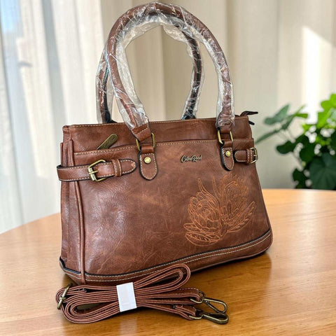 Cotton Road brown PU leather handbag with embroidered Protea design and antique brass hardware