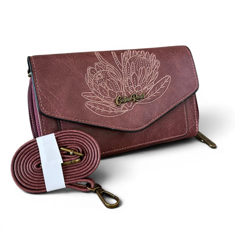 Cotton Road Wallet in deep pink PU leather with embroidered protea design and multiple compartments