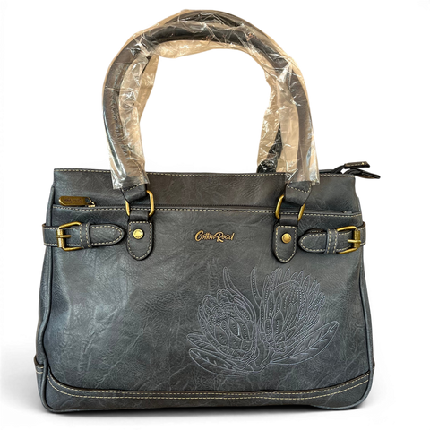Cotton Road Handbag blue PU leather with embroidered Protea design and multiple zip compartments