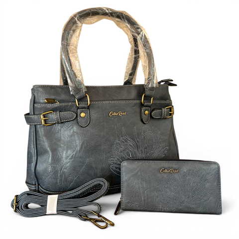 Cotton Road Handbag and matching wallet in blue PU leather with embroidered Protea design and antique brass hardware