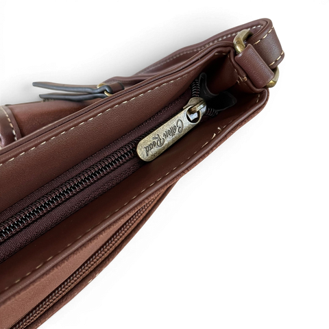 Cotton Road sling bag in brown PU leather with multiple zip and magnetic flap pockets and adjustable crossbody strap