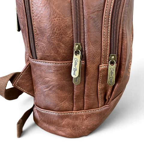 Brown PU leather Cotton Road laptop bag with embroidered Protea design and multiple compartments