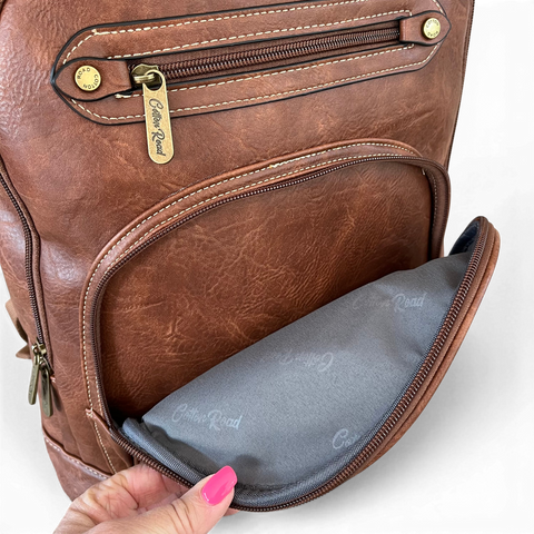 Cotton Road Laptop Bag brown PU leather backpack with embroidered Protea design and multiple compartments