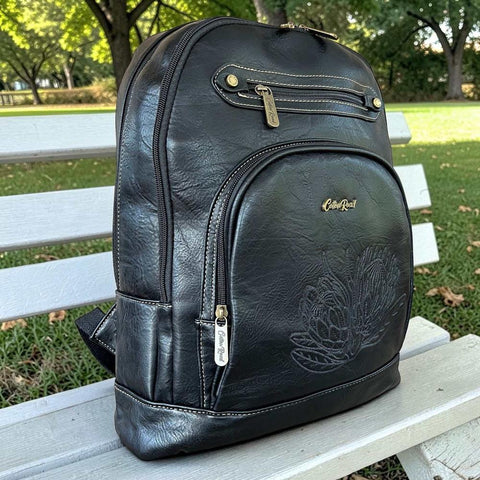 Cotton Road Laptop Bag black PU leather backpack with embroidered Protea design and padded laptop compartment