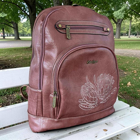 Cotton Road laptop bag pink protea design PU leather backpack with padded laptop sleeve and multiple compartments