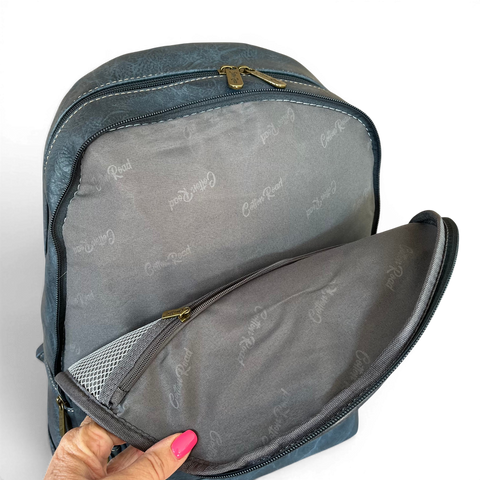 Cotton Road Laptop Bag blue PU leather backpack with embroidered Protea design and multiple compartments