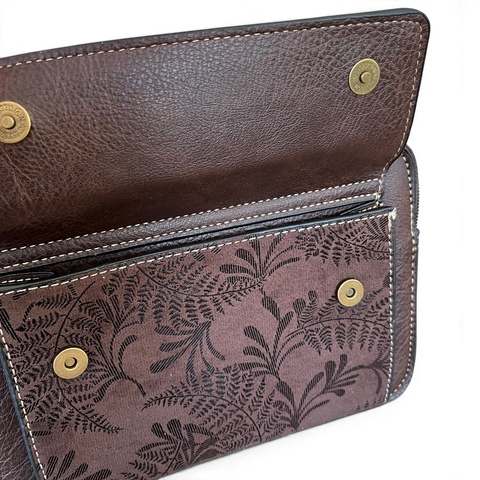 Cotton Road sling bag in coffee brown PU leather with floral front pocket and adjustable branded strap