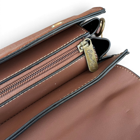 Cotton Road Handbag in brown PU leather with embossed botanical panel and antique brass hardware