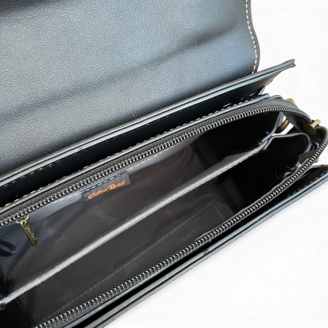 Cotton Road Handbag in black PU leather with embossed botanical panel and antique brass hardware